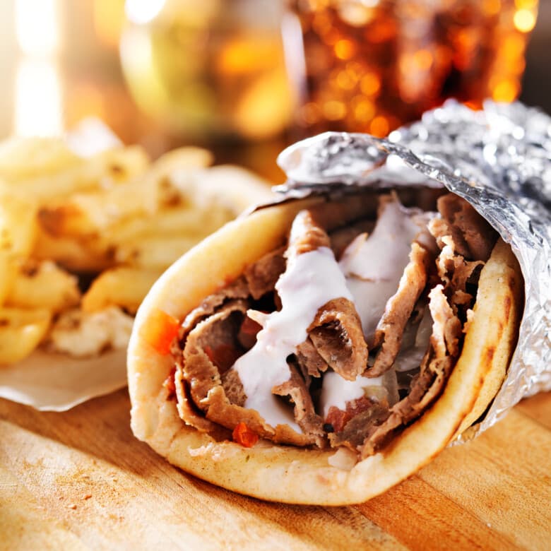 Fresh halal gyro sandwich with fries